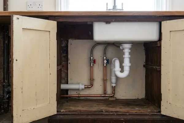 Illustration of new plumbing pipework and taps