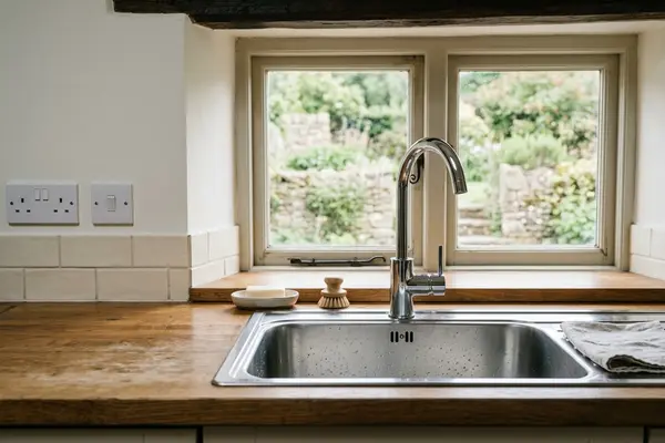 Illustration of new plumbing pipework and taps